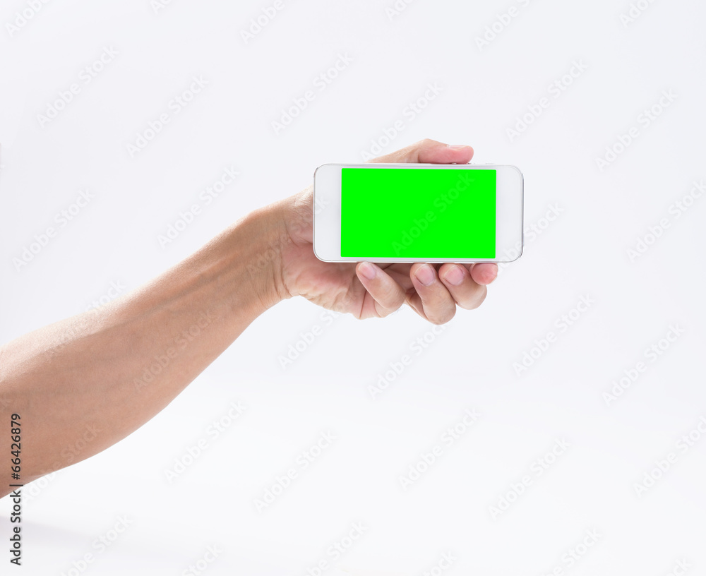 man hand holding smartphone with green screen on white backgroun man hand holding smartphone with green screen on white backgroun