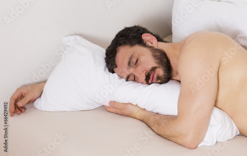 man in bed and sleeping