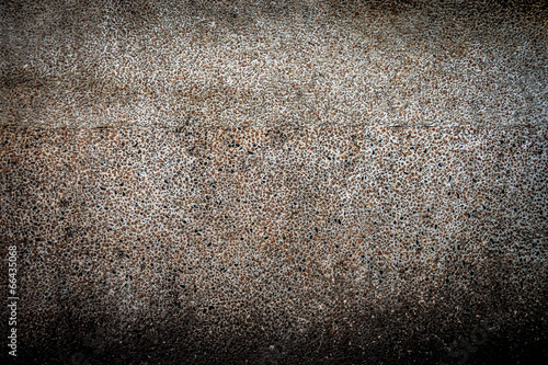 Grunge pebbles concrete wall