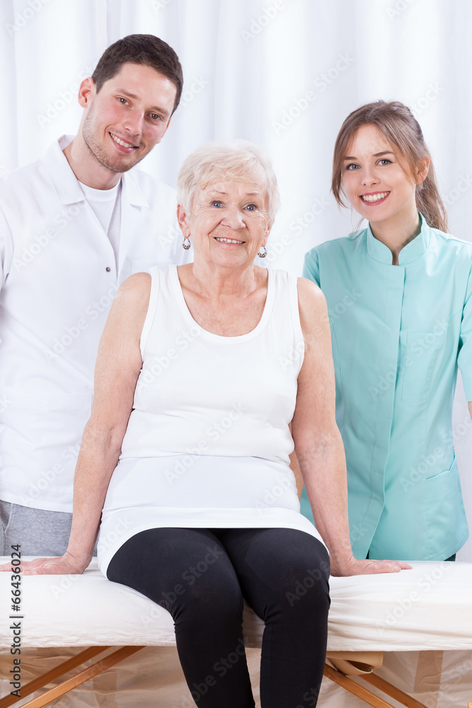 Fototapeta premium Elderly lady with her physiotherapists