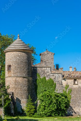 Castle of Javon with its round tower in France. photo