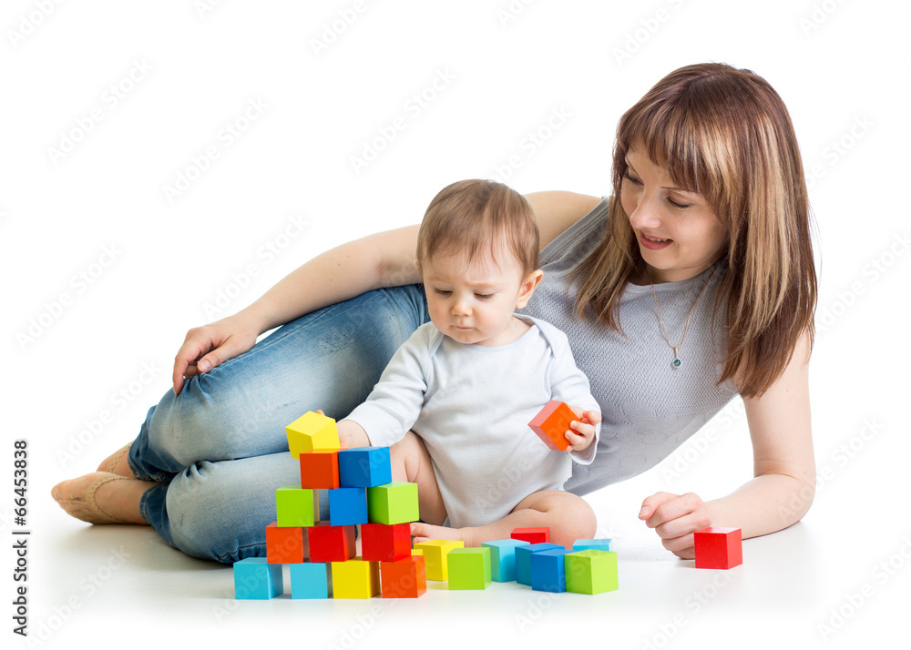 baby boy and his mom play with building blocks baby boy and his mom play with building blocks