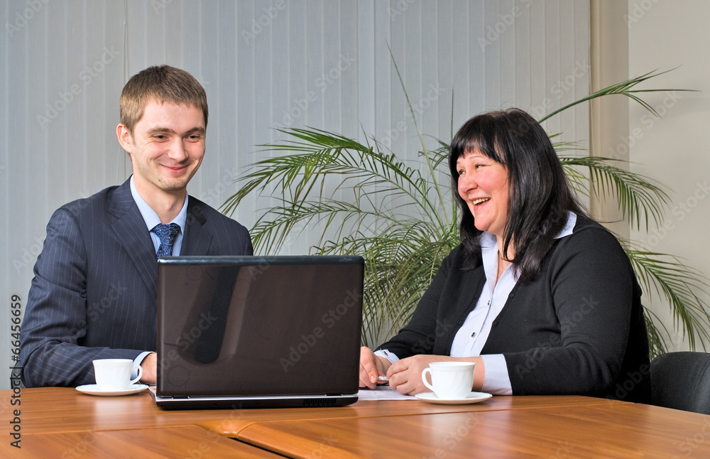 Businessgroup with laptop Businessgroup with laptop