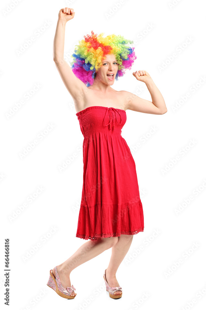 Happy young woman with a wig gesturing joy Happy young woman with a wig gesturing joy