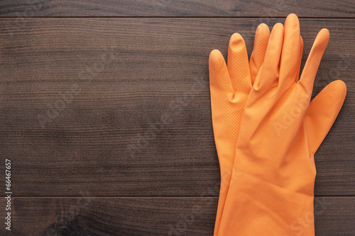 orange rubber cleaning gloves