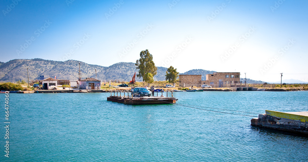 Traditional ferry boat on Vivari Channel,  Butrint, Albania.