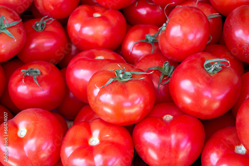 Fresh tomatoes as background