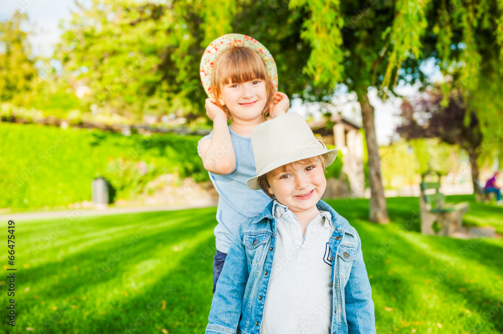 Fototapeta premium Summer portrait of adorable children on a nice sunny day