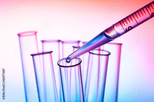 pipette and test tube in a laboratory photo