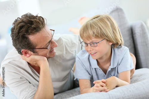 Portrait of daddy and son wearing eyeglasses