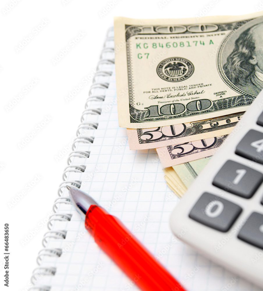 Red pen, the calculator and money on a notebook. Red pen, the calculator and money on a notebook.