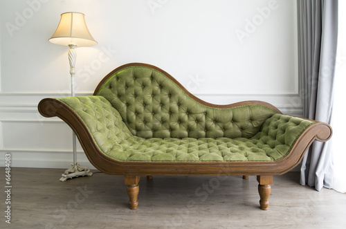 Green sofa with luxurious look