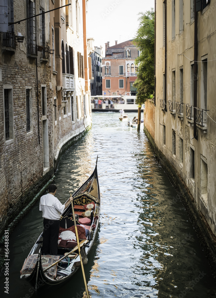 Man on a boat in Venice