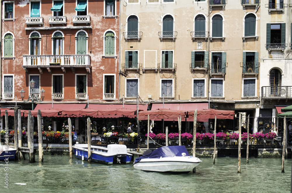 Ancient buildings and boats in the channel in Venice Ancient buildings and boats in the channel in Venice