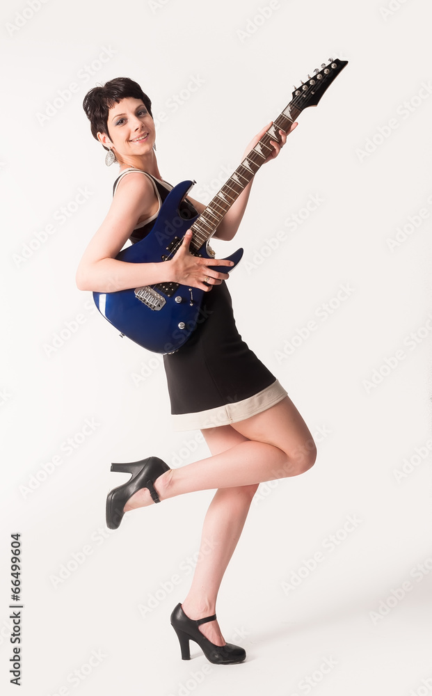 Attractive girl with guitar