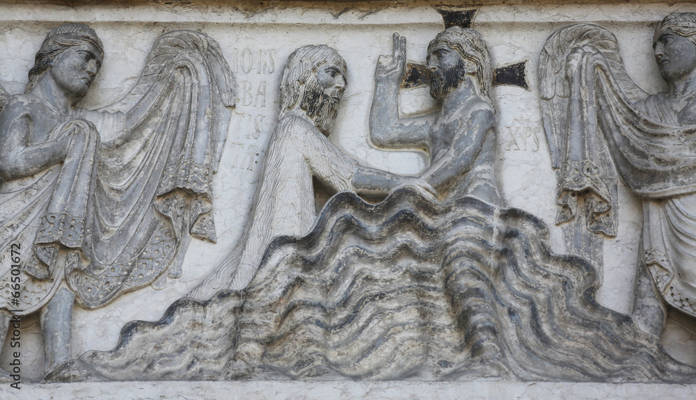Baptism of Jesus Christ relief at the baptistry, Parma, Italy Baptism of Jesus Christ relief at the baptistry, Parma, Italy