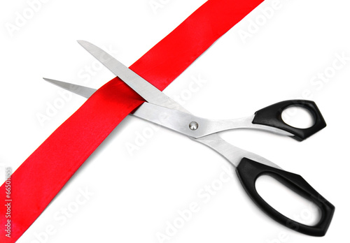 Scissors and red tape. On a white background.