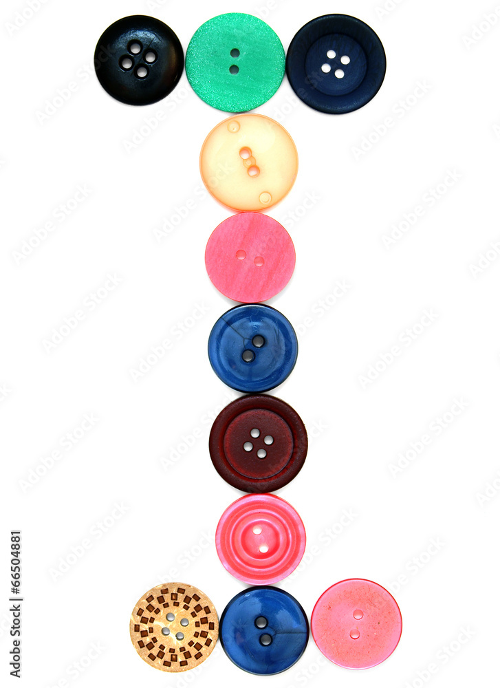 The alphabet from buttons for sewing. The alphabet from buttons for sewing.