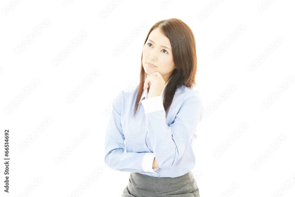 疲れた表情の女性