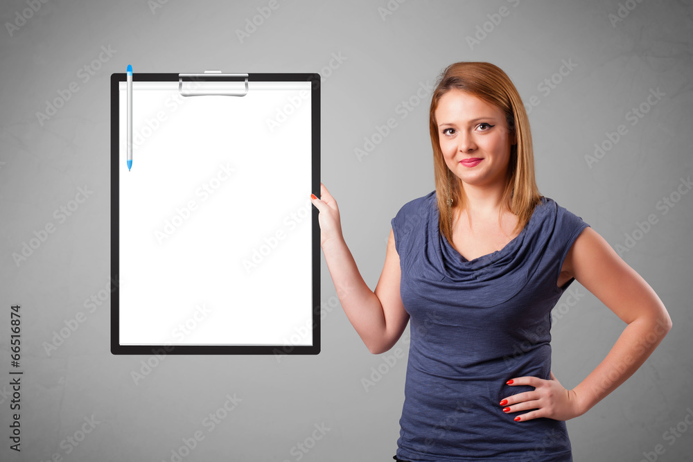 Young girl holding black folder with white sheet copy space Young girl holding black folder with white sheet copy space