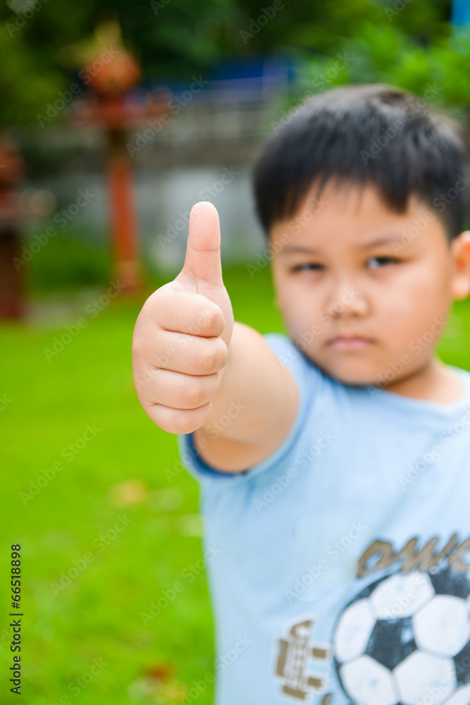 cute boy showing like symbol. cute boy showing like symbol.