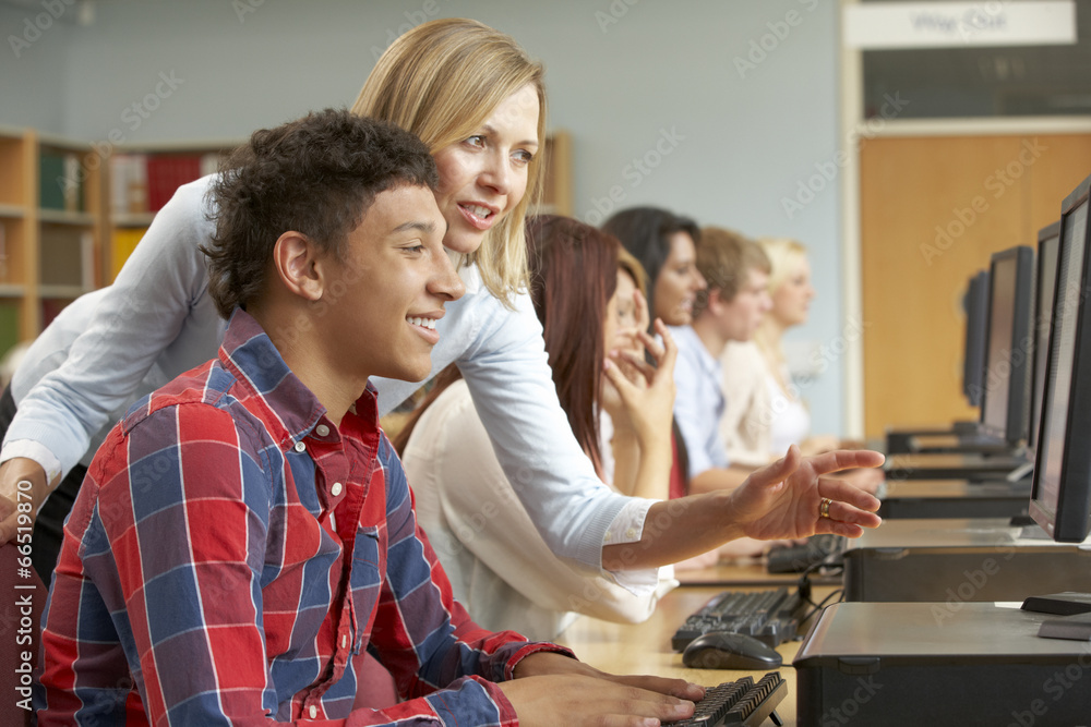 Fototapeta premium Students working on computers in library