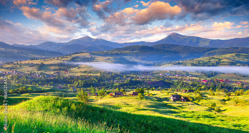 Fototapeta premium Beautiful summer landscape in the mountain village.
