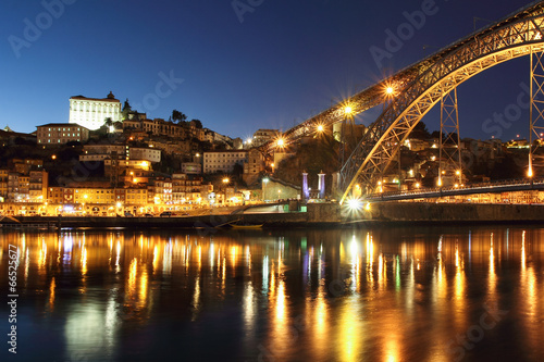 Dom Luis bridge and Porto at dusk