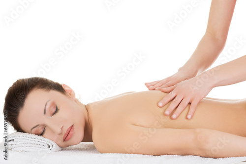 Woman relaxing beeing massaged in spa saloon