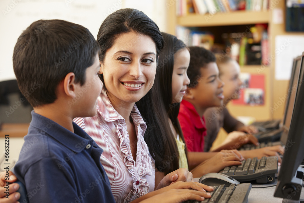 Fototapeta premium Teacher and schoolchildren in class