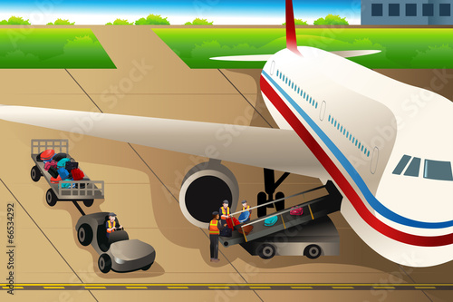 Workers loading luggages into an airplane in the airport