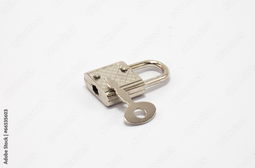 Padlock with key in white isolate Padlock with key in white isolate