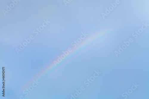 rainbow in blue sky © vvoe