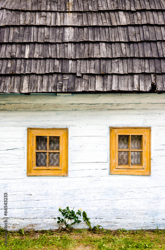 Detail of colorful windows on old traditional house Detail of colorful windows on old traditional house