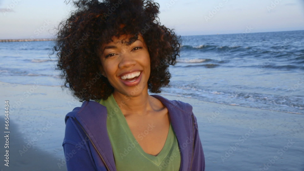 Portrait of woman having fun and smiling at beach Portrait of woman having fun and smiling at beach
