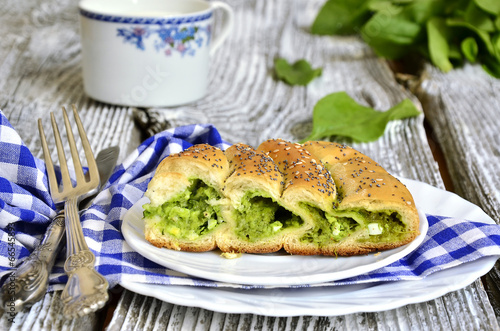 Spiral pie with cheese and spinach.