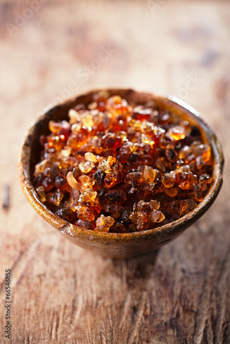 Gum arabic, also known as acacia gum - in bowl photo