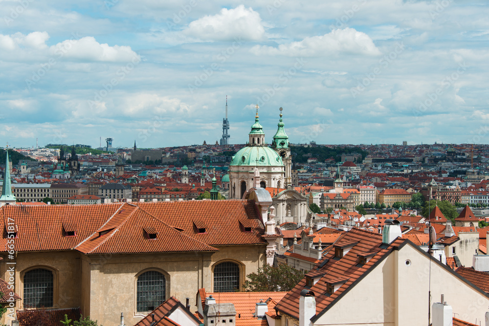 Rooftops in Prague on bright summer day