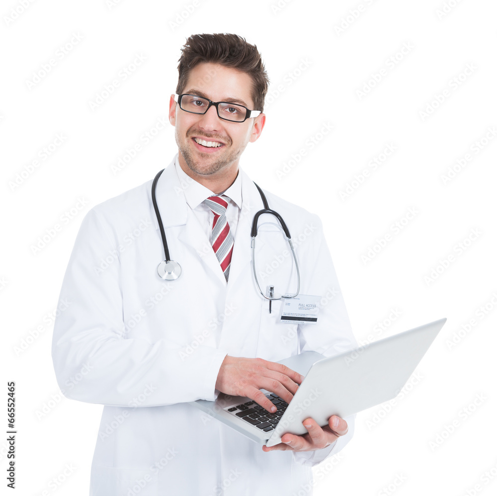Doctor Using Laptop Over White Background Doctor Using Laptop Over White Background