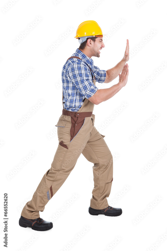 Happy Manual Worker Pushing Billboard Happy Manual Worker Pushing Billboard