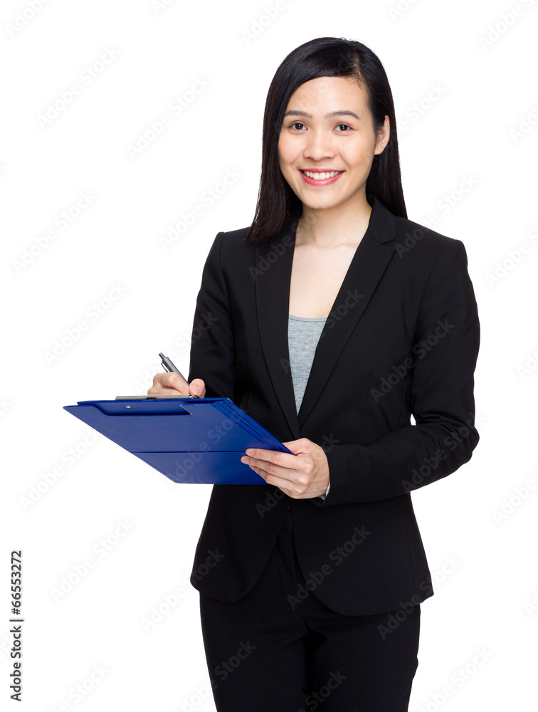 Woman write on clipboard Woman write on clipboard