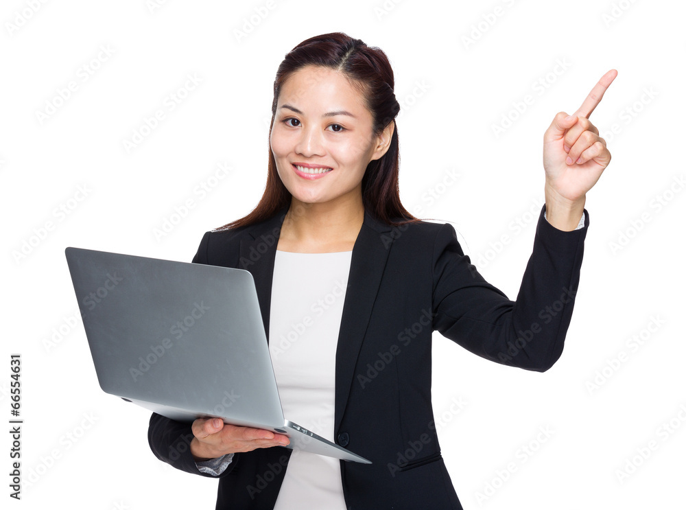 Business woman with laptop computer and finger point up Business woman with laptop computer and finger point up