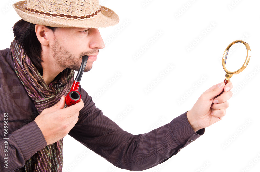 Young detective with pipe and magnifying glass Young detective with pipe and magnifying glass