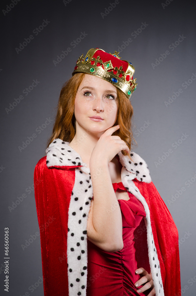 Queen in red dress in studio Queen in red dress in studio