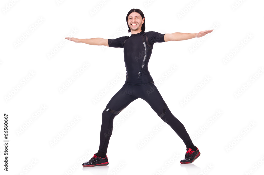 Obraz premium Young man doing exercises on white