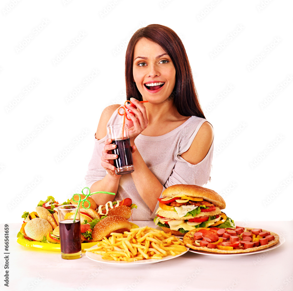 Woman eating fast food.