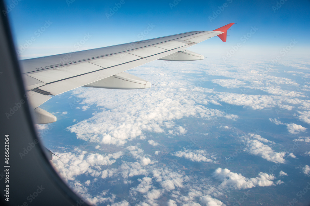 Fototapeta premium Airplane wing out of window