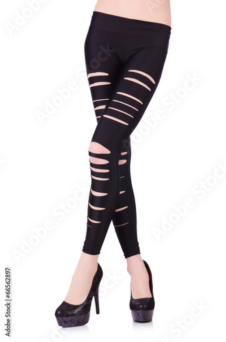 Woman legs with stockings on white