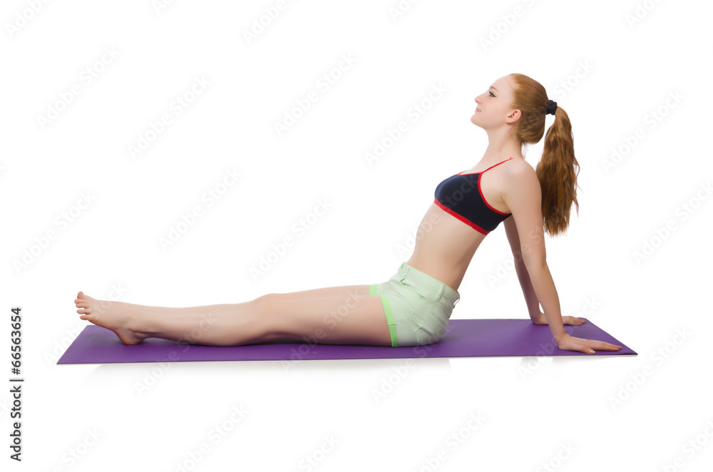 Young woman doing sport exercises isolated on white Young woman doing sport exercises isolated on white