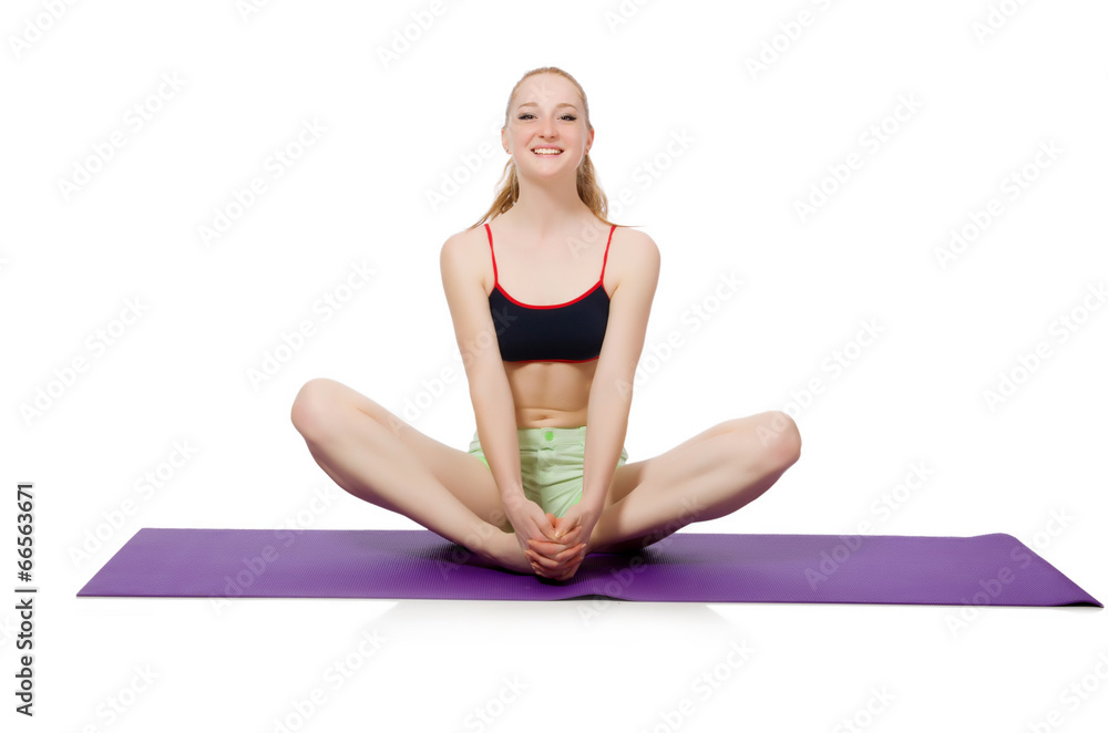 Young woman doing sport exercises isolated on white Young woman doing sport exercises isolated on white